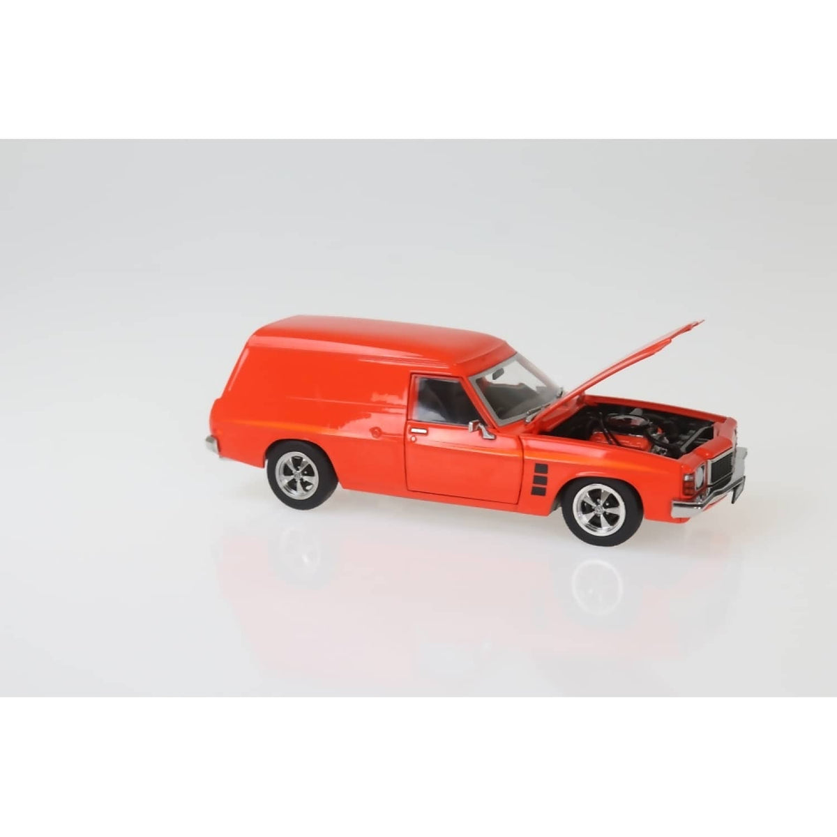 DDA COLLECTIBLES - 1:24 SCALE - MANDARIN RED 1975 HJ HOLDEN SANDMAN PANELVAN - DIECAST MODEL
